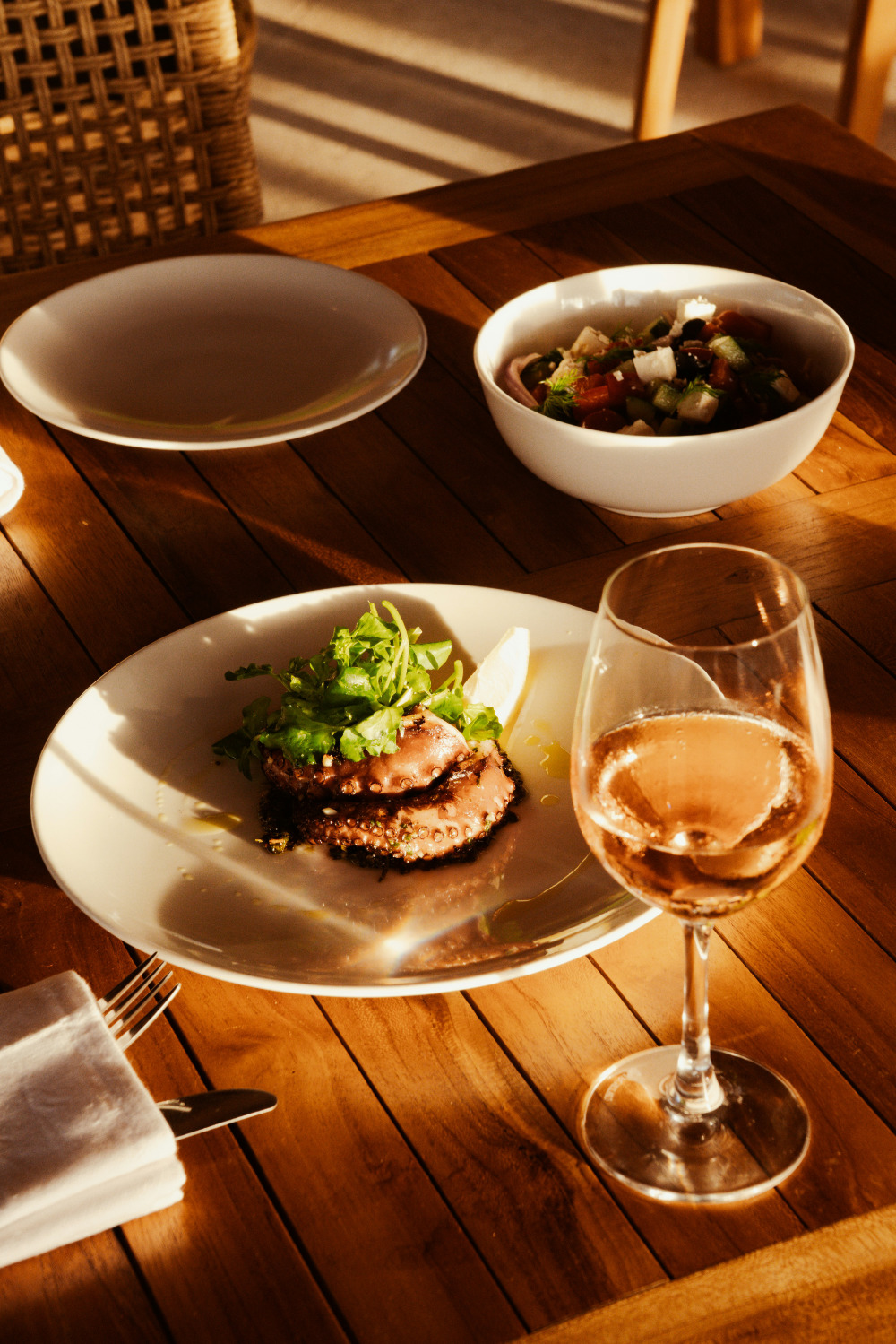 Wine bottles and glasses selected for editorial discovery