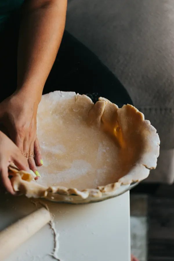 Dough crust being prepared